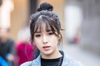 女生长发怎么扎好看街头达人给你示范